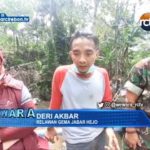 Warga Dan TNI Bersihkan Sungai