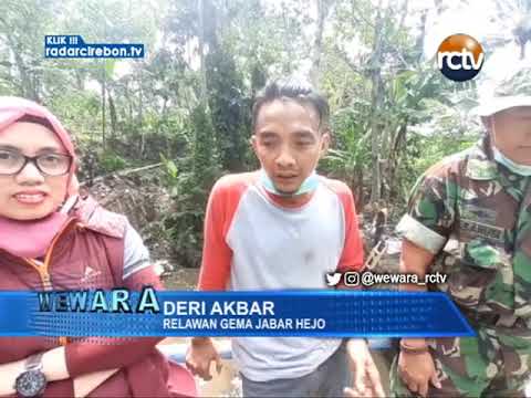 Warga Dan TNI Bersihkan Sungai