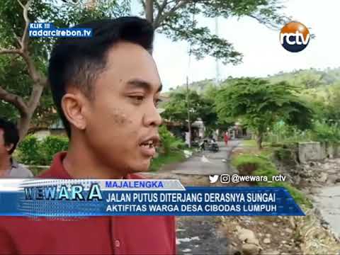 Jalan Putus Diterjang Derasnya Sungai