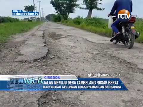 Jalan Menuju Desa Tambelang Rusak Berat