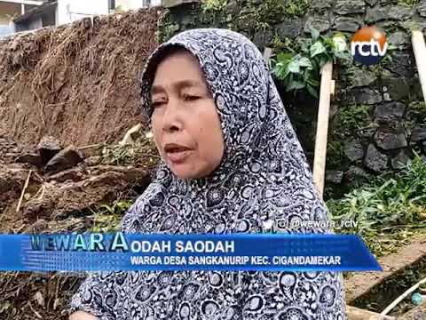 Tembok Penahan Tebing Tergerus Longsor