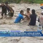 Dua Warga Terjebak Luapan Air Sungai