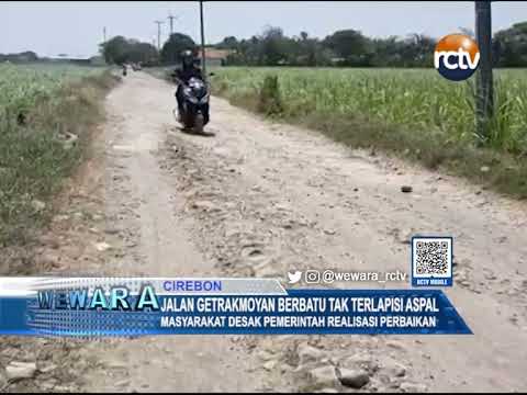 Jalan Getrakmoyan Berbatu Tak Terlapisi Aspal