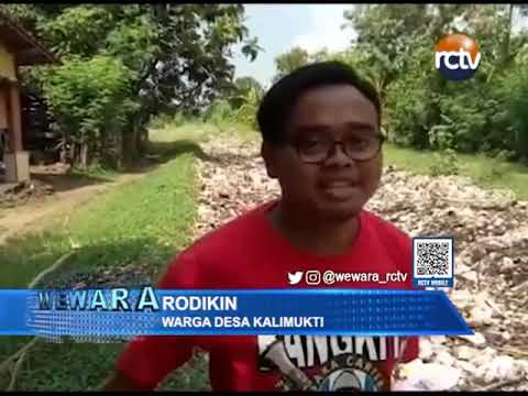 Saluran Irigasi Desa Kalimukti Tertutup Sampah