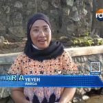 Warga Mencuci di Saluran Irigasi Ketika Kemarau