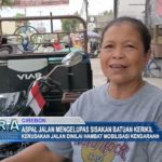 Aspal Jalan Mengelupas Sisakan Batuan Kerikil