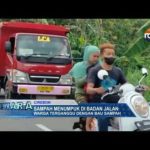 Sampah Menumpuk di Badan Jalan