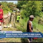 Warga Pasang Patok Bambu di Bibir Sungai