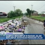 Sampah Menumpuk di Badan Jalan