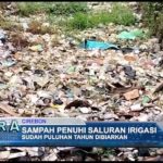 Sampah Penuhi Saluran Irigasi