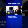 Kepala Kucing Imut Tersangkut Kandang
