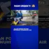Jalan Poros Rusak Dipenuhi Genangan Air