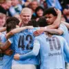 Erling Haaland merayakan gol bersama rekan setim di Manchester City dalam laga Premier League