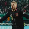 Pemain Austria Romano Schmid selebrasi gol