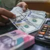Mata uang Garuda dibuka di level Rp18.070 per dolar AS, menguat 21 poin atau sekitar 0,12 persen.