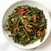 Aneka masakan rumahan praktis seperti tumis kangkung